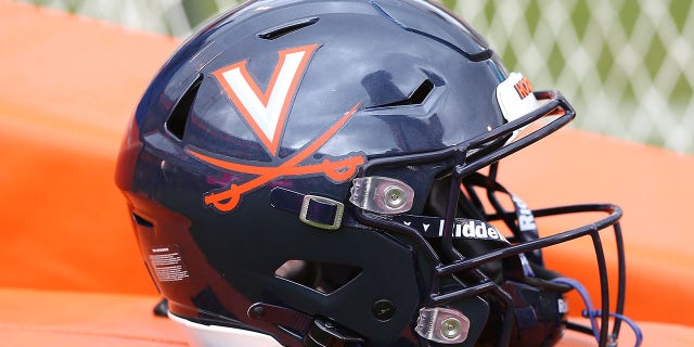 Virginia Cavaliers helmet with logo resting on the sidelines during a college football game between the North Carolina Tar Heels and the Virginia Cavaliers on November 05, 2022, at Scott Stadium in Charlottesville, VA.