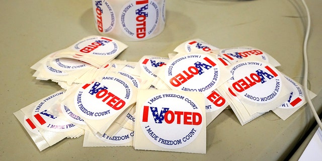 "I Voted" stickers are ready to be distributed to each person who filled out their ballot, Tuesday, Nov. 8, 2022, at a Brandon, Miss., precinct.