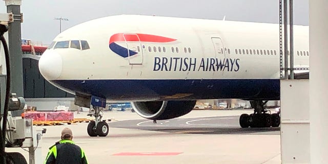 British Airways plane carrying Prince William and Princess Catherine of Wales arrives at Logan Airport on Wednesday, Nov. 30, 2022. (John Tlumacki/The Boston Globe via AP, Pool)