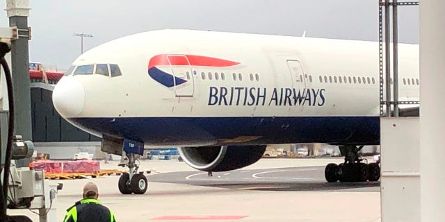 British Airways plane carrying Prince William and Princess Catherine of Wales arrives at Logan Airport on Wednesday, Nov. 30, 2022. (John Tlumacki/The Boston Globe via AP, Pool)