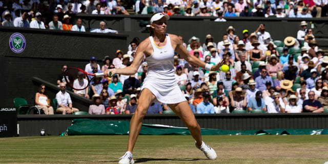 Kazakhstan's Elena Rybakina is during her match against Tunisia's Ons Jabeur during the Wimbledon women's singles final in London on July 9, 2022.