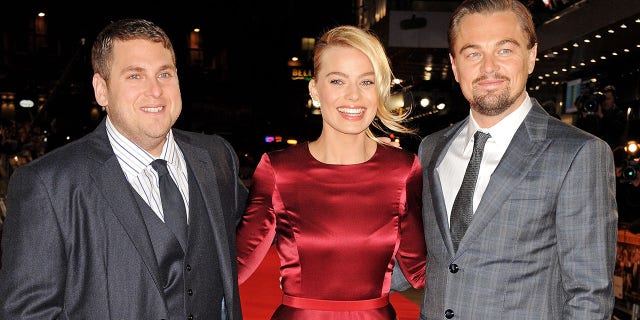 Jonah Hill, left, Margot Robbie and Leonardo DiCaprio, right, attend the U.K. premiere of "The Wolf Of Wall Street."