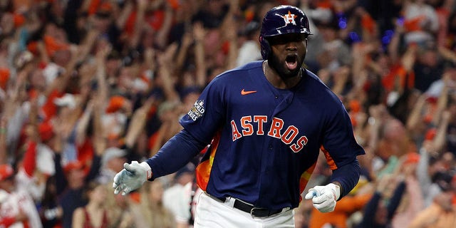 Yordan Alvarez #44 of the Houston Astros celebrates after hitting a three-run home run against the Philadelphia Phillies during the sixth inning in Game Six of the 2022 World Series at Minute Maid Park on November 05, 2022 in Houston, Texas.
