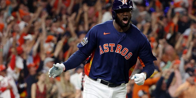 Yordan Alvarez #44 of the Houston Astros celebrates after hitting a three-run home run against the Philadelphia Phillies during the sixth inning in Game Six of the 2022 World Series at Minute Maid Park on November 05, 2022 in Houston, Texas.