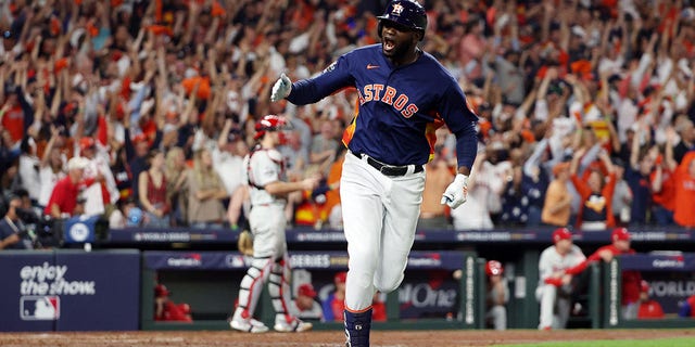 Yordan Alvarez #44 of the Houston Astros hits a three-run home run against the Philadelphia Phillies during the sixth inning in Game Six of the 2022 World Series at Minute Maid Park on November 05, 2022 in Houston, Texas. 