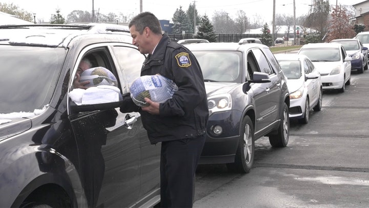Michigan police hand out turkeys for Thanksgiving to ‘alleviate some financial strain’ amid the holidays Michigan police hand out turkeys for Thanksgiving to ‘alleviate some financial strain’ amid the holidays