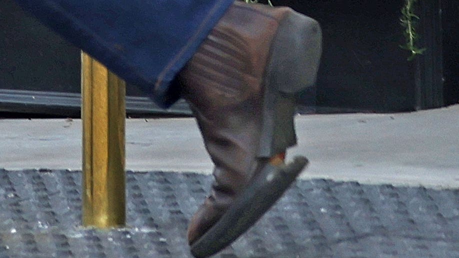 Close-up of Hunter's boot with a broken sole