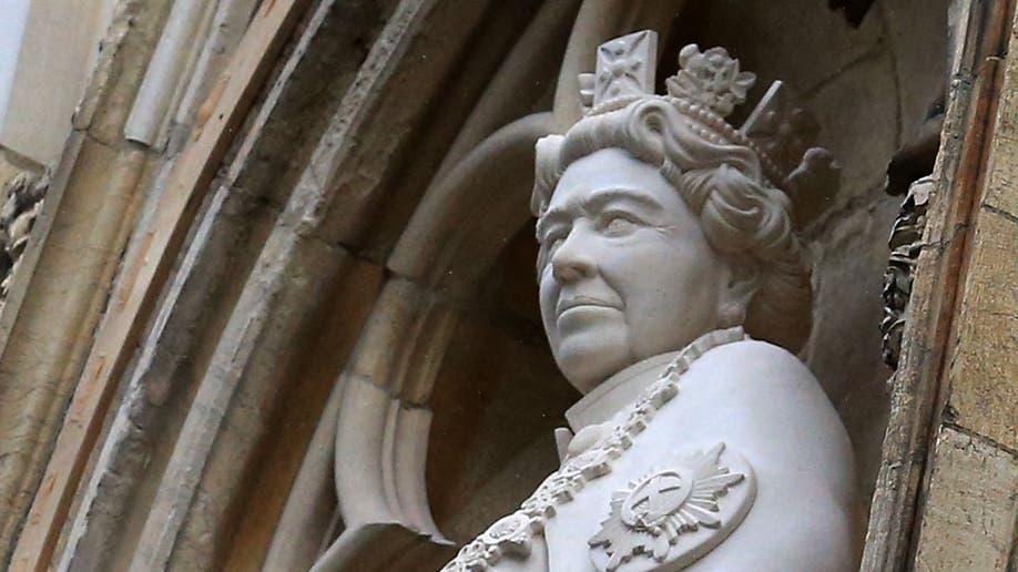 A close up of the Queen Elizabeth II statue at York Minster