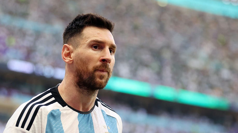 Lionel Messi walks off the field