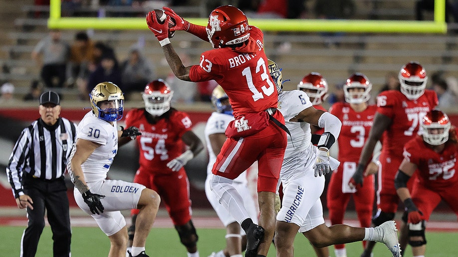 A photo of Sam Brown completing a pass