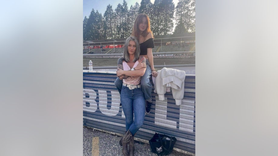 Missing Trinity Backus poses with her mother