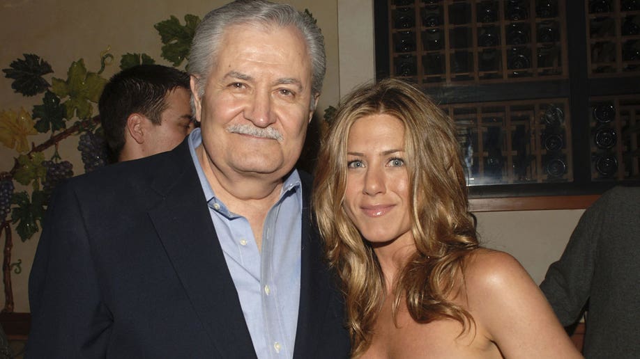 Jennifer Aniston poses with her father John