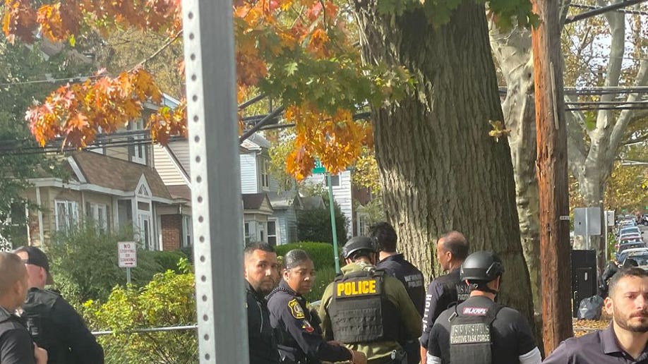 Two New Jersey Police Officers Shot, Officers Search Door-to-door For ...