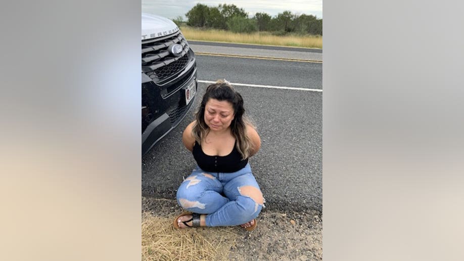 Donna Dulce Sanchez in cuffs