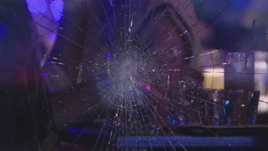 NYC gay bar smashed window
