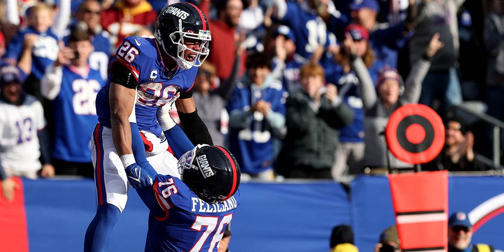 Richie James of the New York Giants celebrates a touchdown against News  Photo - Getty Images