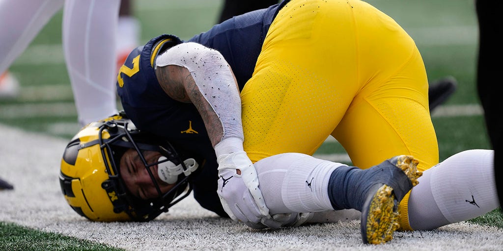 No. 2 Michigan s Heisman hopeful out for season to undergo knee