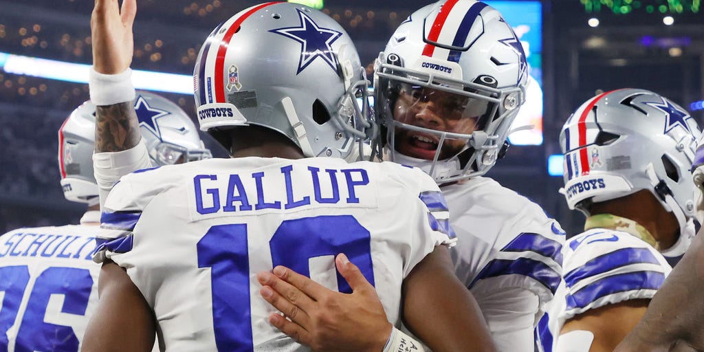 Dallas Cowboys' Dak Prescott celebrates a touchdown during the second half  of an NFL football game against the Indianapolis Colts, Sunday, Dec. 4,  2022, in Arlington, Texas. (AP Photo/Ron Jenkins Stock Photo 