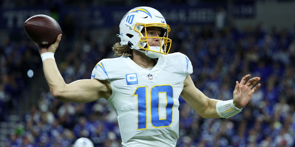 Chargers throttle past Colts in playoff-clinching victory