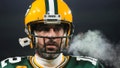 Green Bay Packers quarterback Aaron Rodgers (12) breaths out as he warms up before an NFL football game against the Los Angeles Rams in Green Bay, Wis. Monday, Dec. 19, 2022.