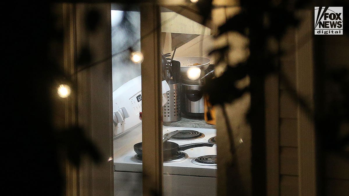 photo shows the inside of the home and the kitchen
