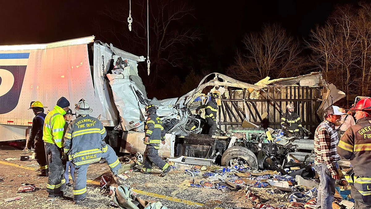 Fire officials around the crashed truck
