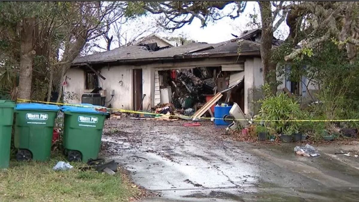 A Florida home damaged in a Christmas fire is shown