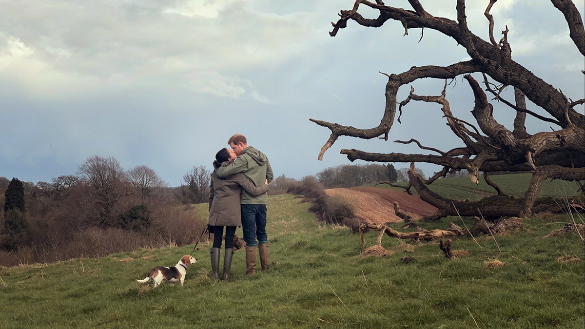 Meghan Markle and Prince Harry embracing