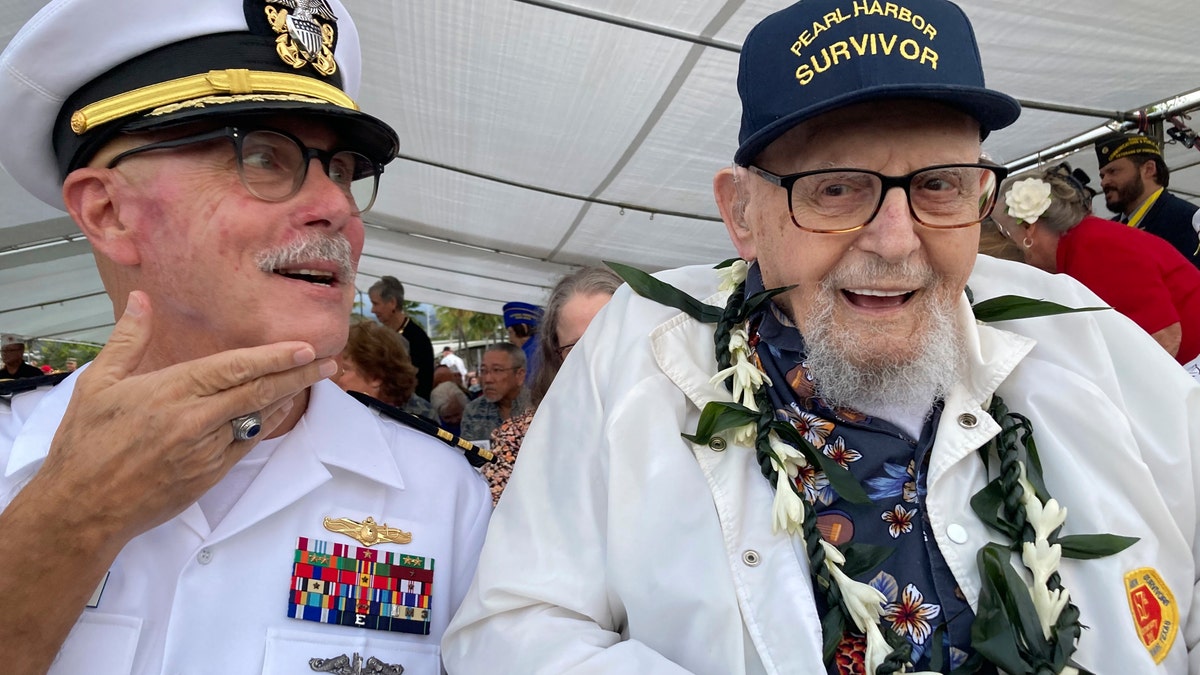 Pearl Harbor veteran Ira Schab and his son, retired Navy Cmbr. Karl Schab