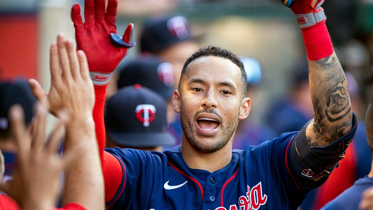 Carlos Correa celebrating