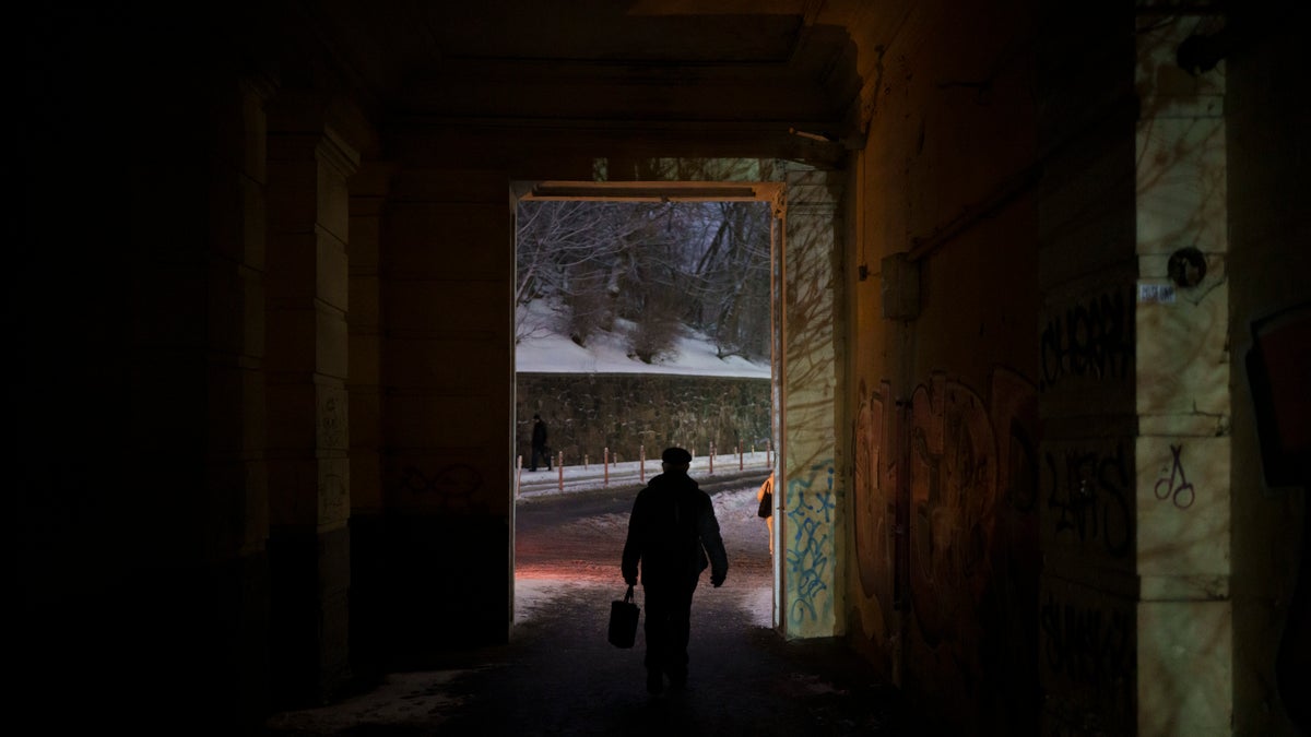 Man walking through power outage