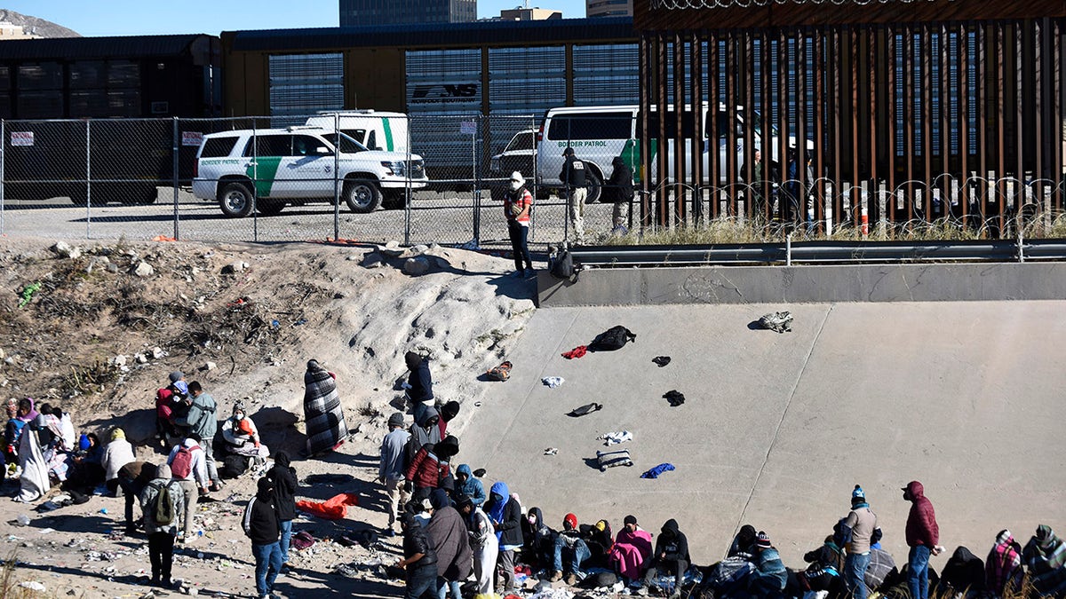 Migrants waiting in a line