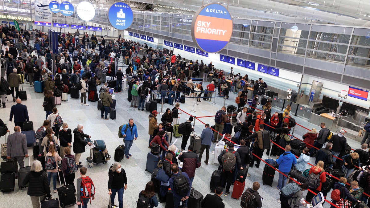 Travelers waiting at an airport