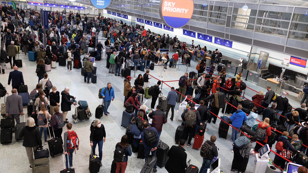 Travelers waiting at an airport