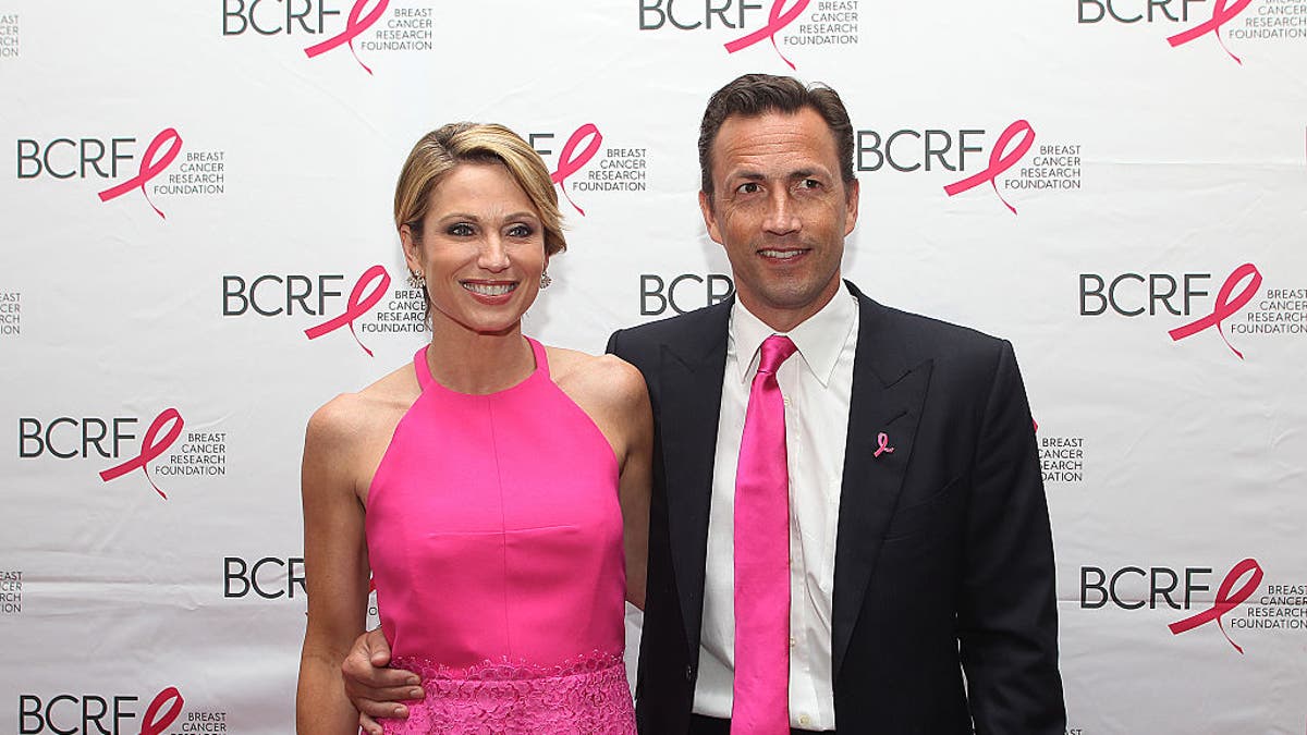 Andrew Shue and Amy Robach