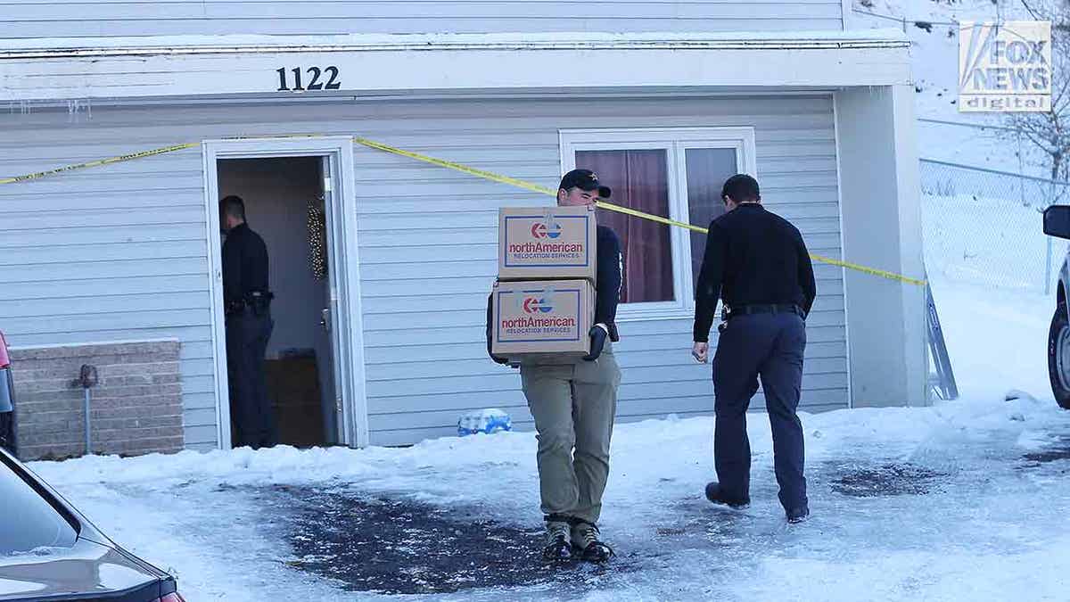 Boxes containing the belonging of the Idaho victims are moved