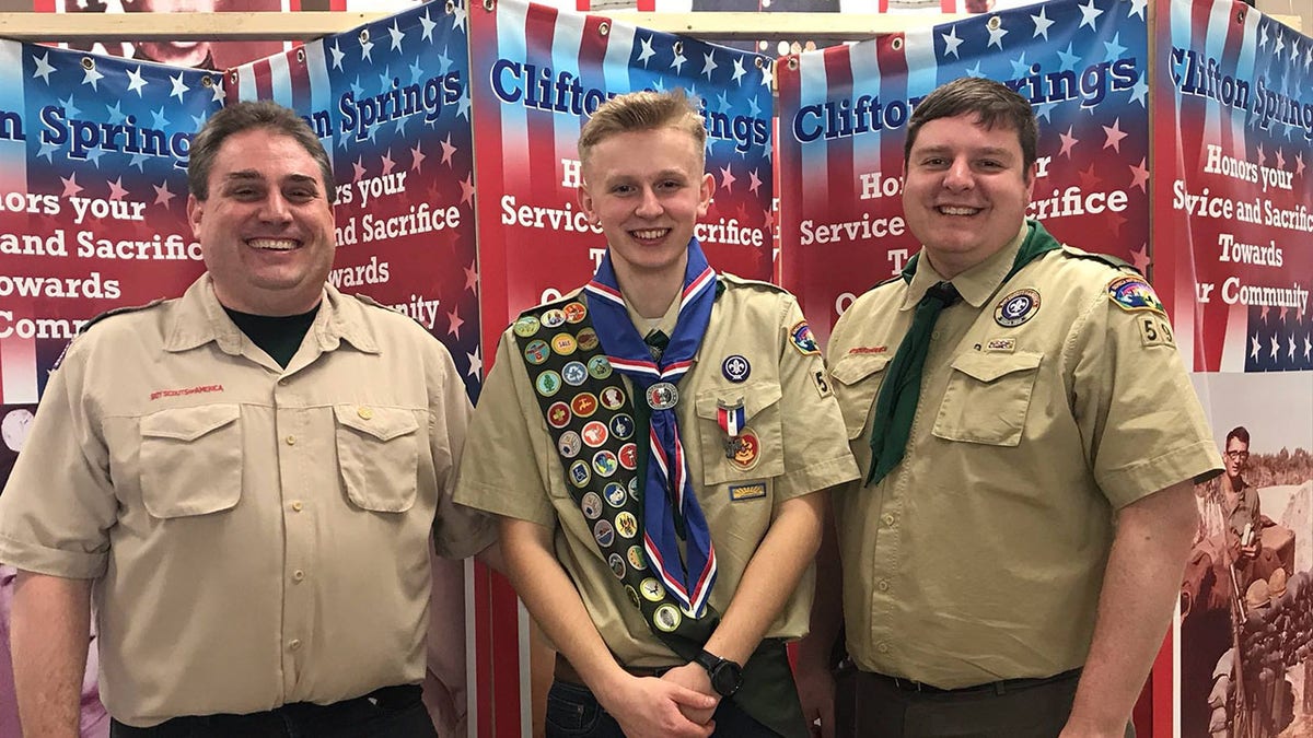 Ken DeLand with Eagle Scouts