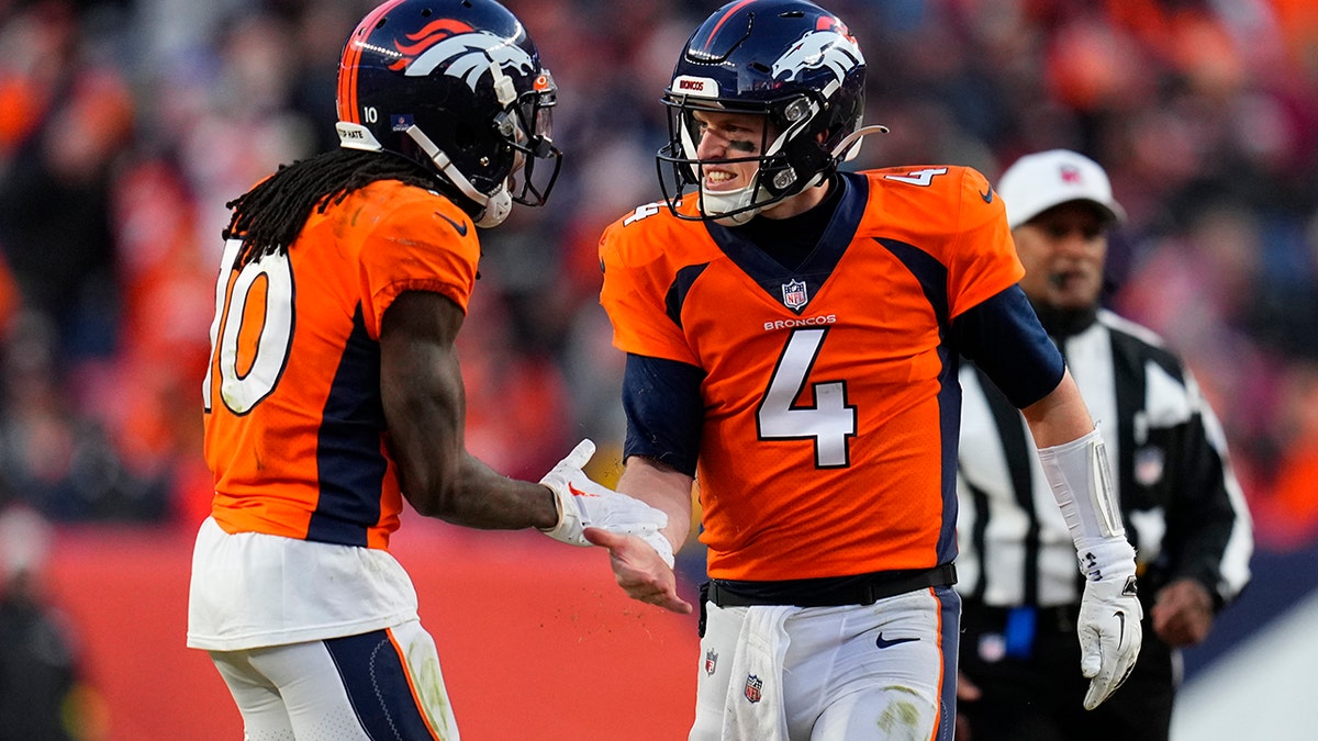 Denver Broncos quarterback Brett Rypien (4) looks to throw against the  Atlanta Falcons during the second half of the Pro Football Hall of Fame NFL  preseason game, Thursday, Aug. 1, 2019, in