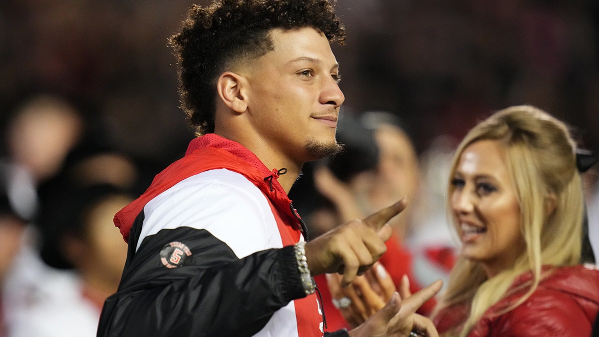 Brittany Mahomes Goes Fiery Red in Spiked Louboutins to KC Chiefs Game –  Footwear News