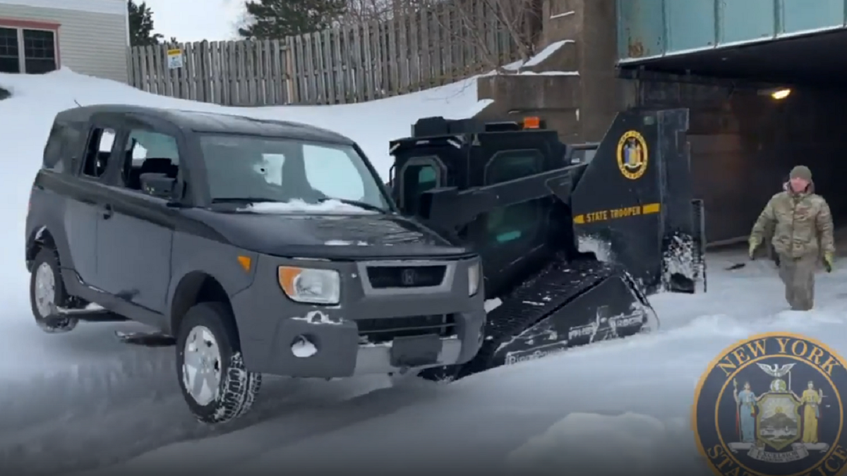 Buffalo winter storm SUV cleared off street