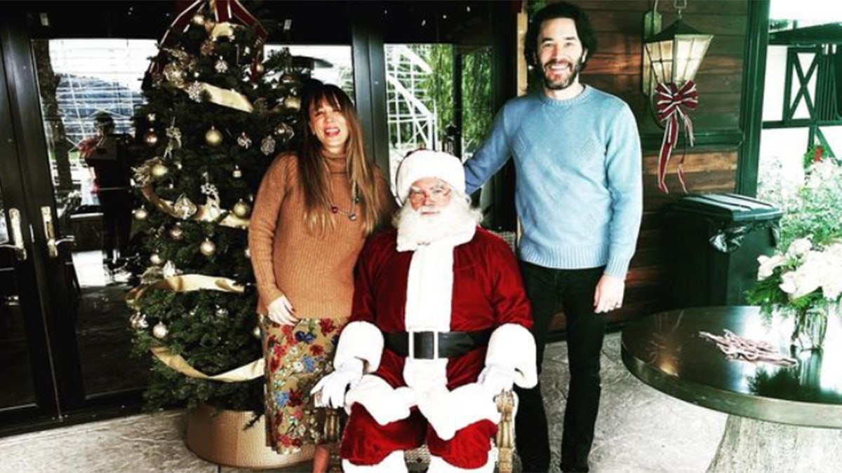 Kaley Cuoco and Tom with Santa