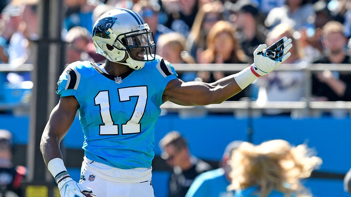 Carolina Panthers player Devin Funchess signals a first down