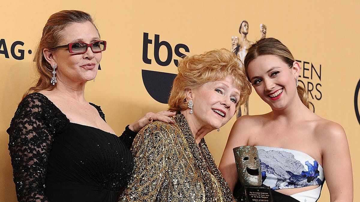 Star Wars icon Carrie Fisher poses with Debbie Reynolds and daughter Billie Lourd