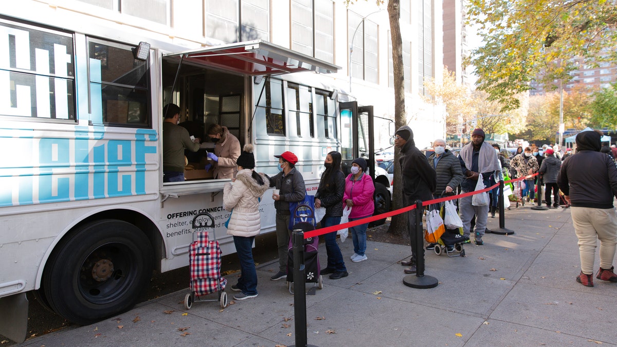 City relief volunteers hand out soup