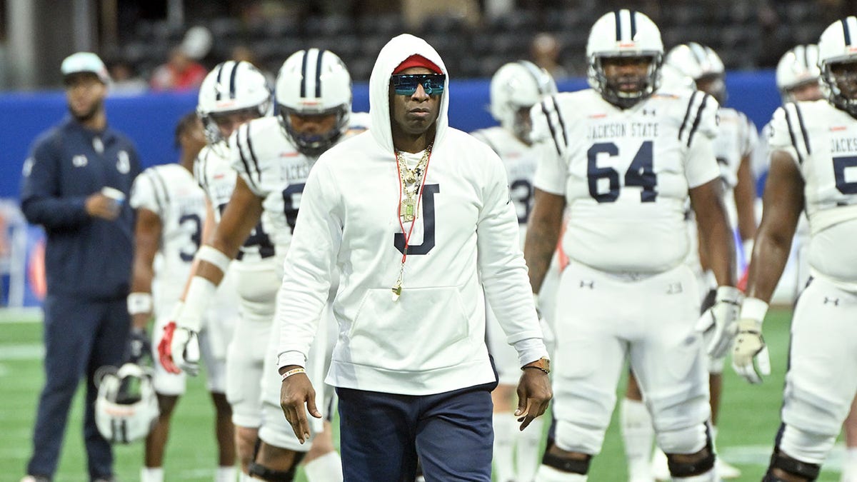 Deion Sanders on the sidelines of a game