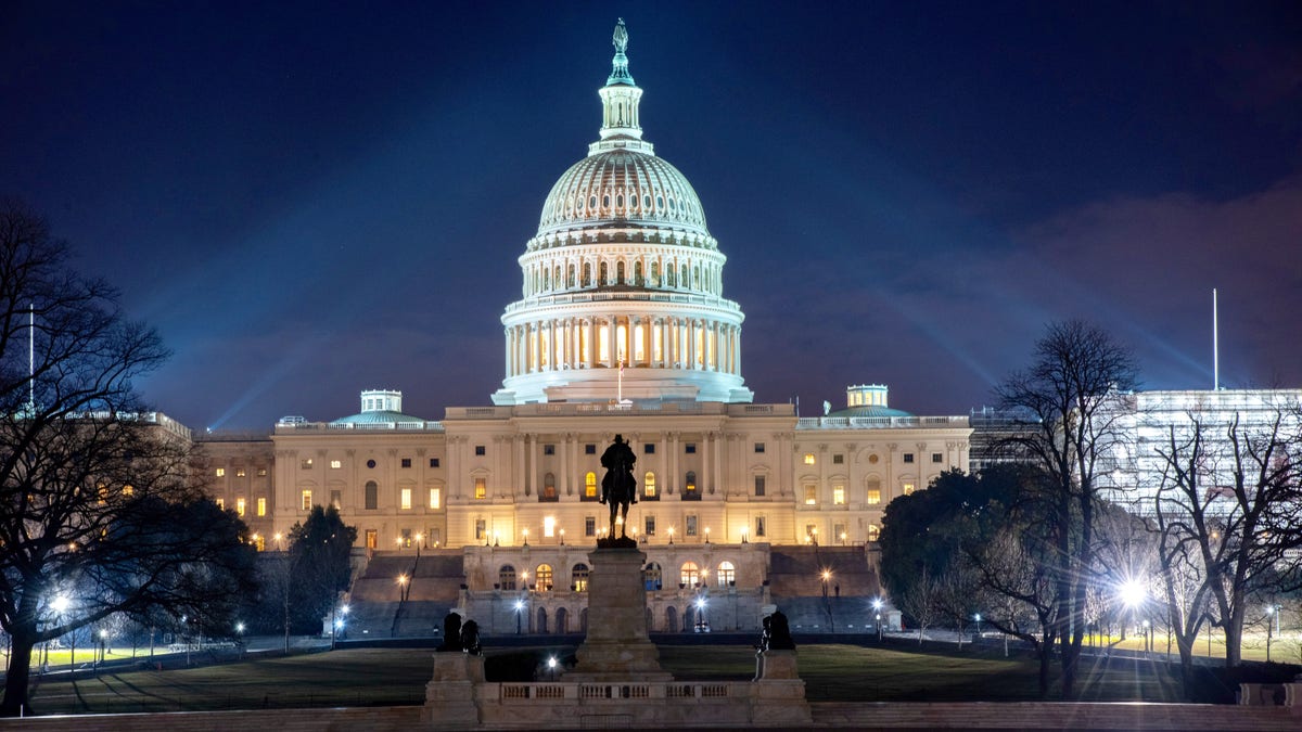 United States Capitol at night with Grant statue in front