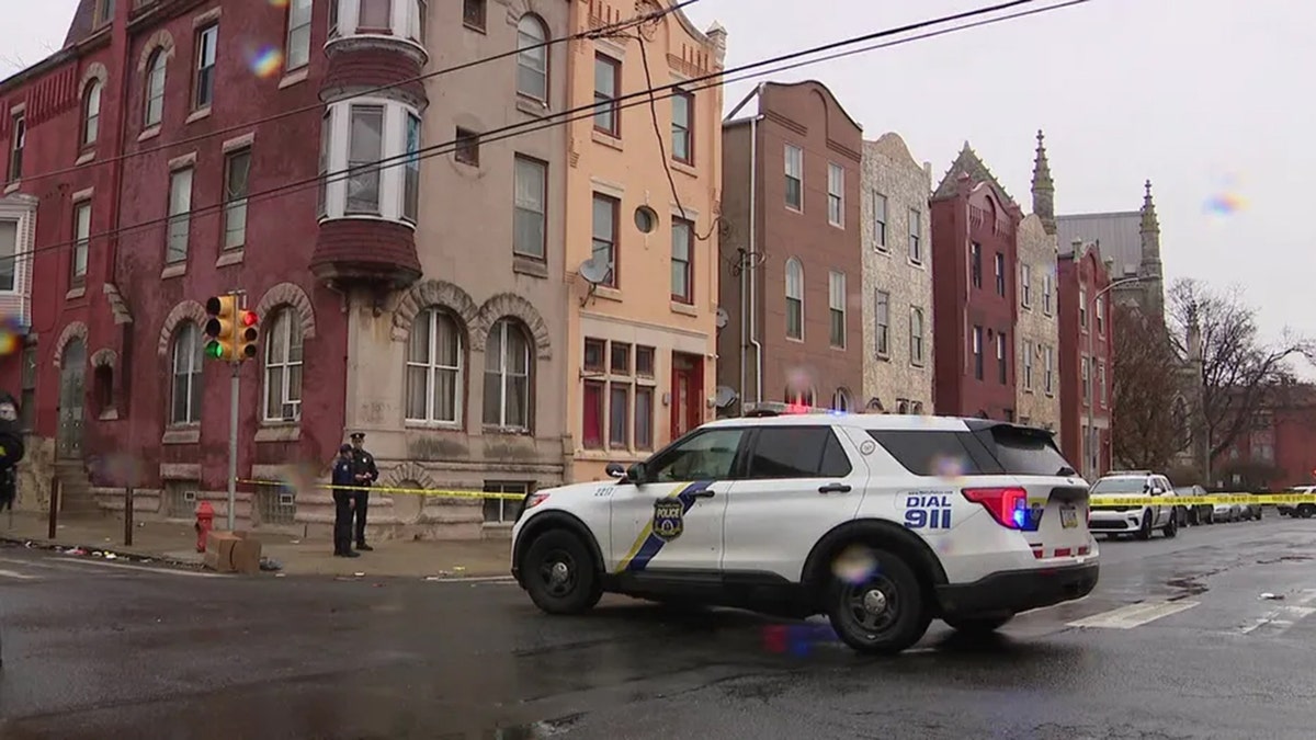 Philadelphia police outside the scene of the deadly home invasion