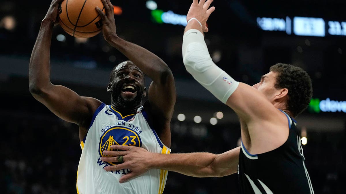 Draymond Green drives