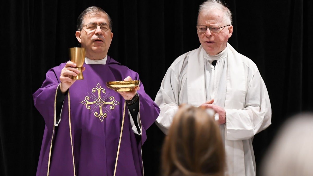 Father Frank Pavone celebrating Catholic Mass at CPAC