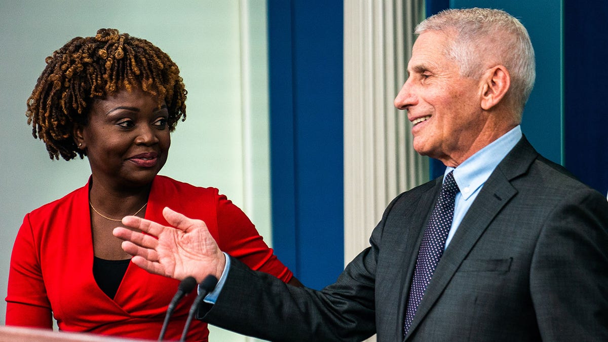 Fauci with Biden White House press secretary 